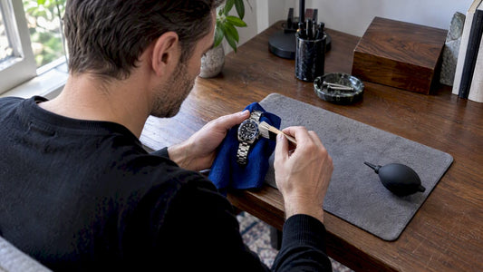 Collector cleaning a watch without water